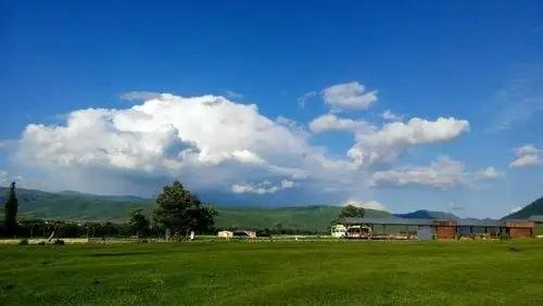 Mountain road and grassland scenery in Xinjiang